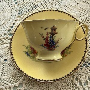 Atlas Stoke on Trent Grimwades vintage bone china tea cup & saucer, 1930s yellow